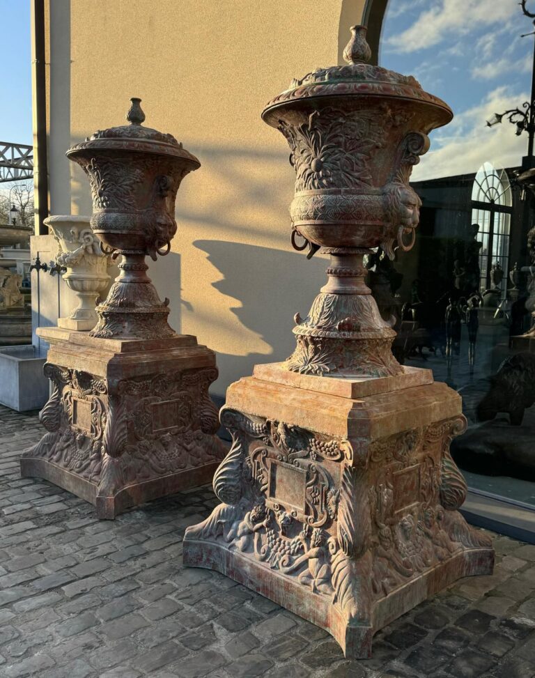 Pair of Monumental Cast Iron Urns