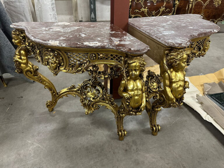 Pair of Gilt Consoles with Cherubs